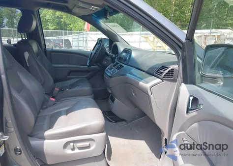 2010 Honda Odyssey Ex-L z USA, uszkodzony, nr VIN 5FNRL3H77AB053699